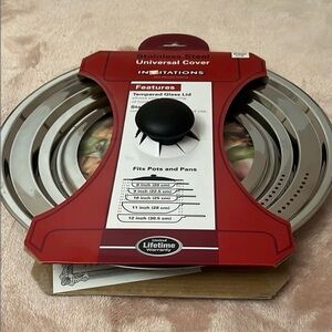 Stainless Steel Universal Lid with Black Knob. Fits Various Pot Sizes.